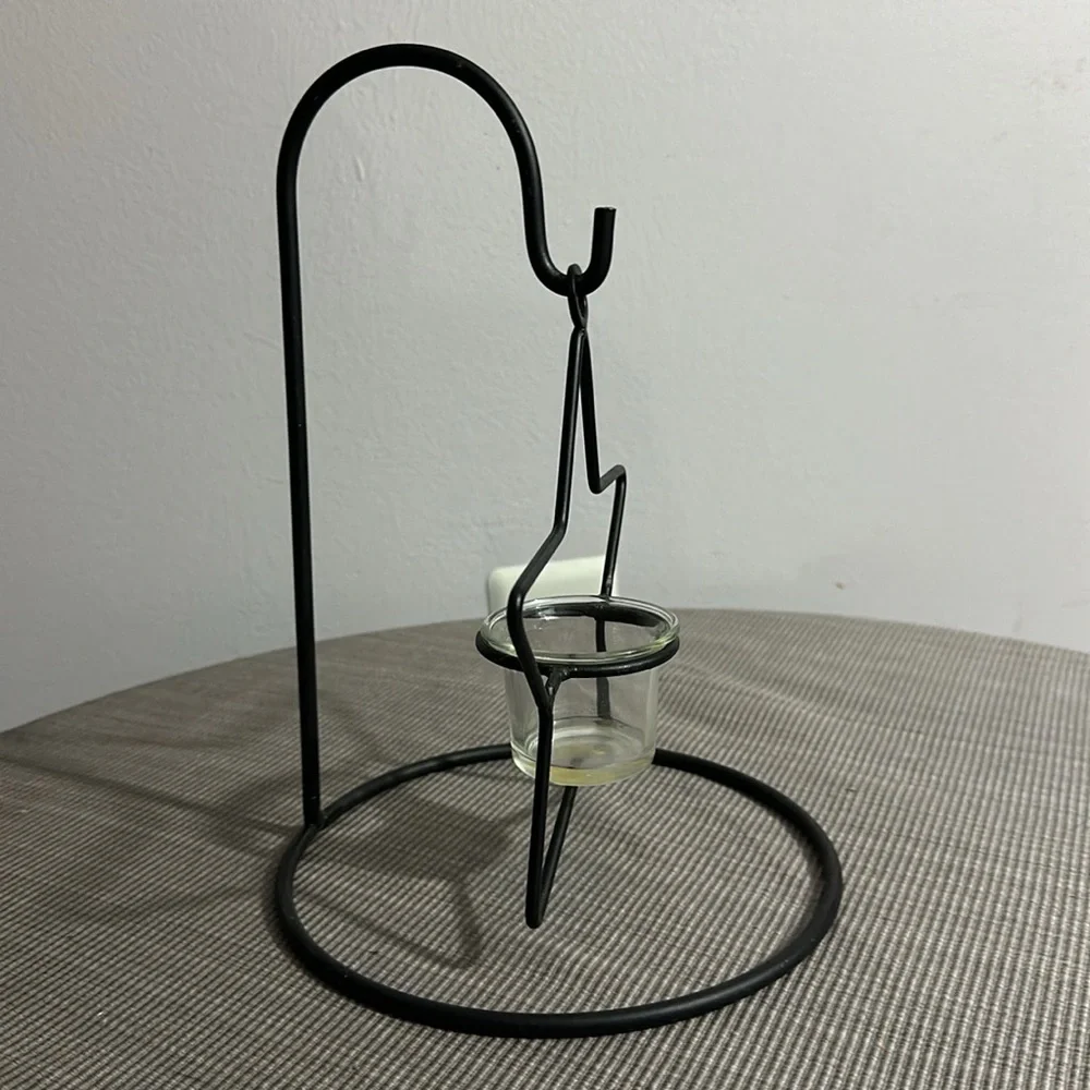 Metal star candleholder with metal hanger 10 inches tall